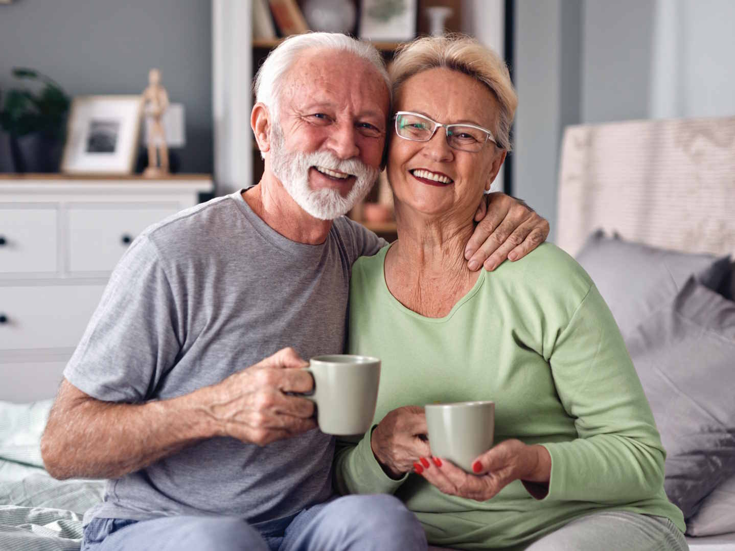 Older couple drinking coffee