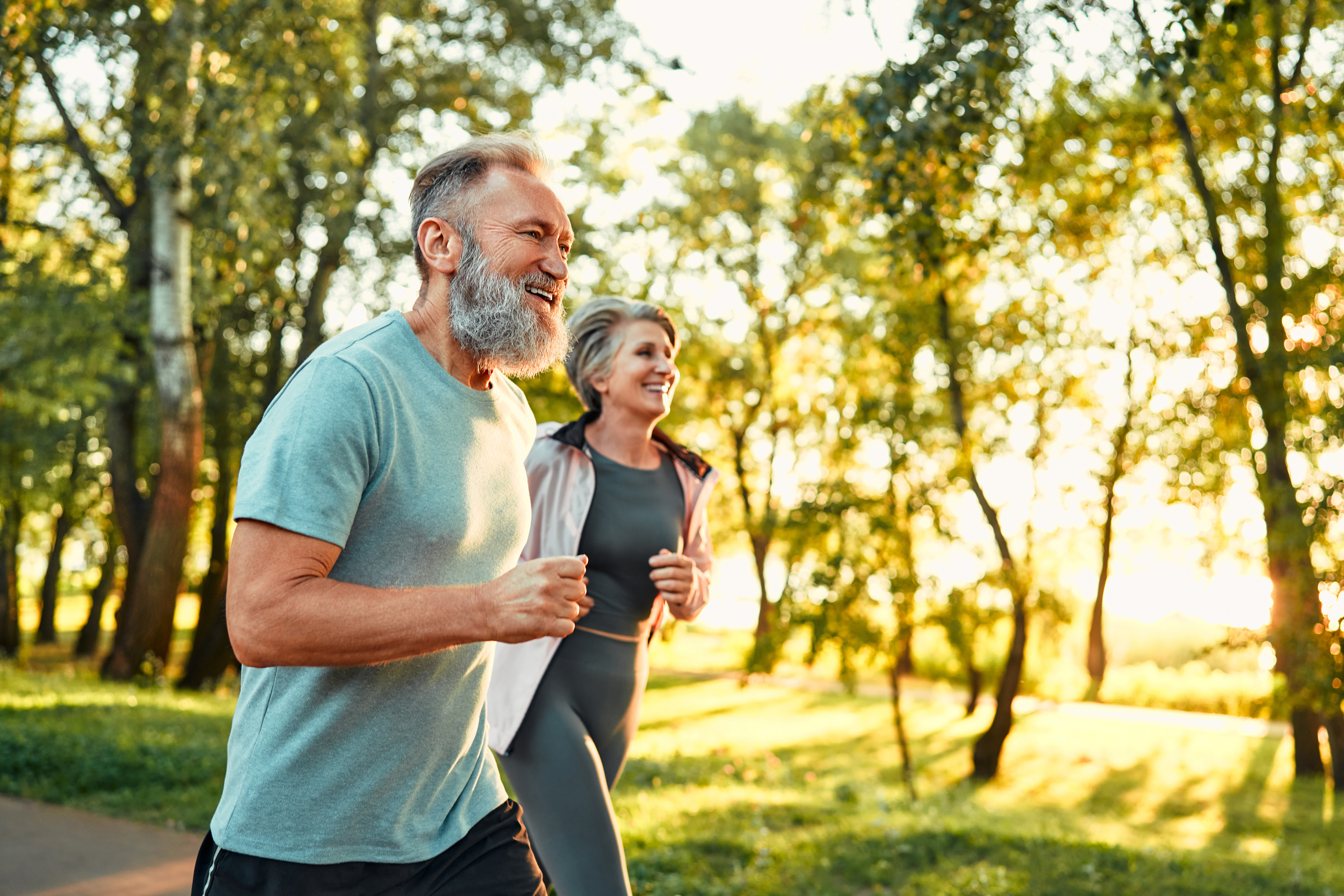 Couple looking at each other happily while enjoying nature.